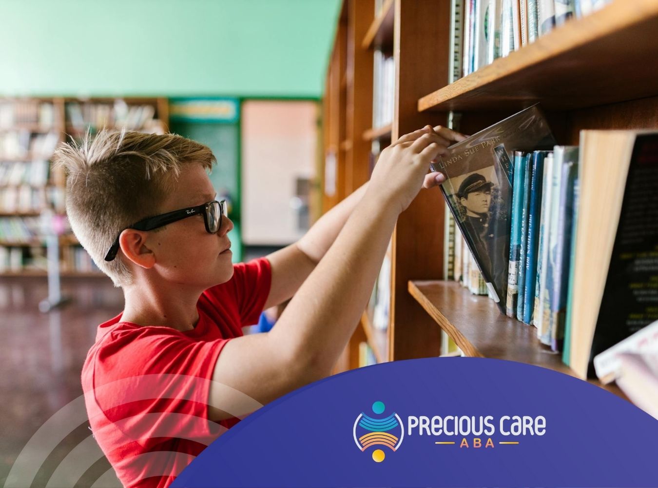 Autistic adult picking a book from library shelf during ABA therapy at a bright room in New Jersey.