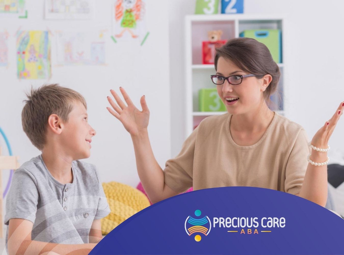 BCBA working with an autistic boy during a learning activity.