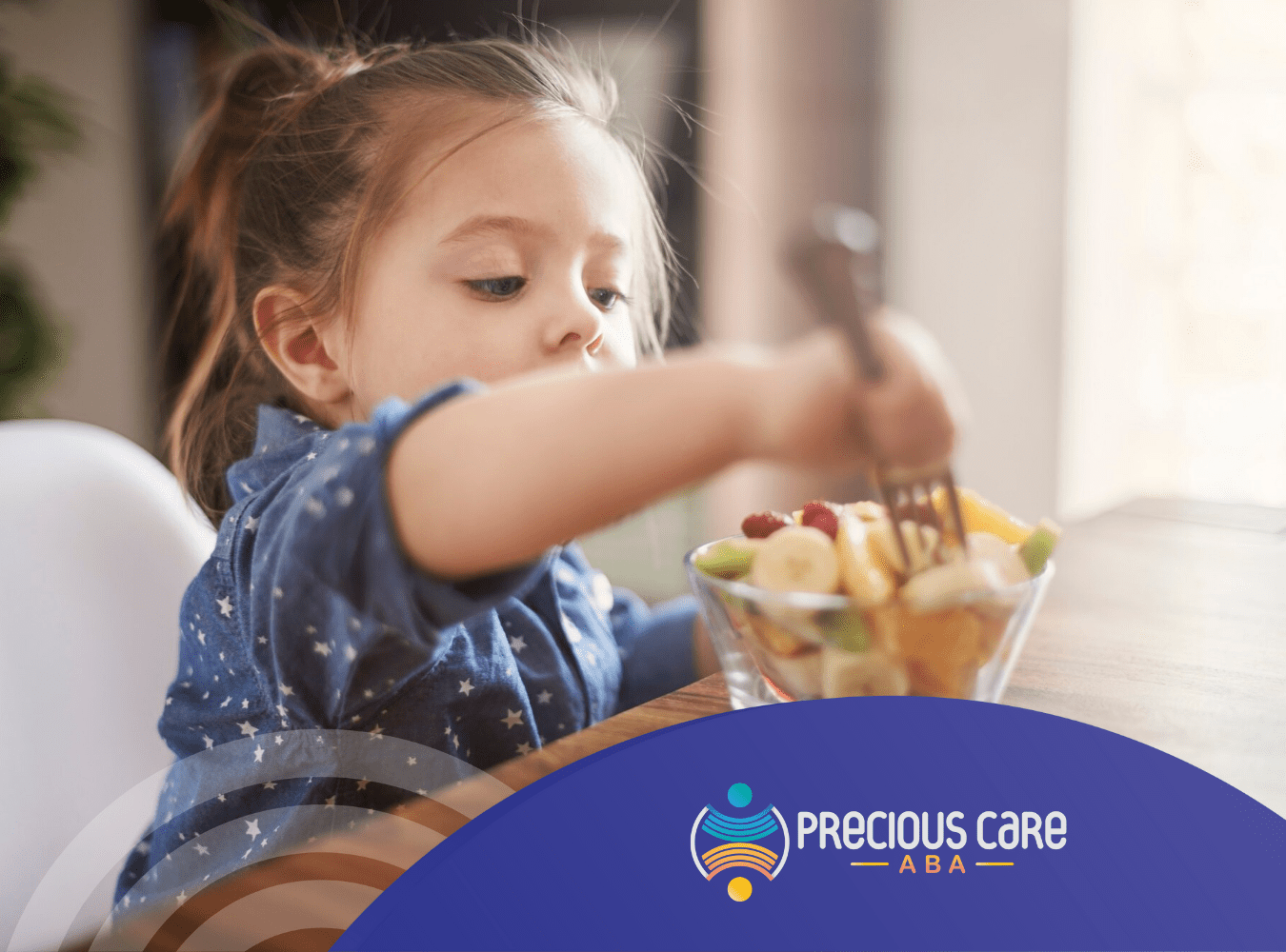 A child with autism eating a bowl of fruits