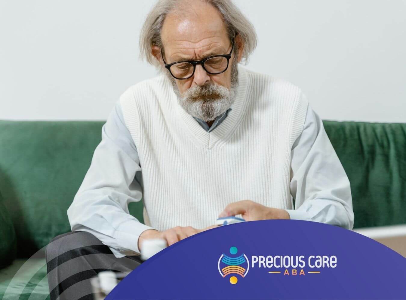 Autistic Elderly man sitting on couch checking his medication after his ABA therapy in Maryland.